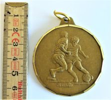Medallie Fussball-Zweikampf