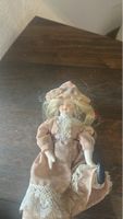 Poupée ancienne en porcelaine état d'occasion