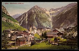 AK Goeschenen, Ortsansicht mit Alpen