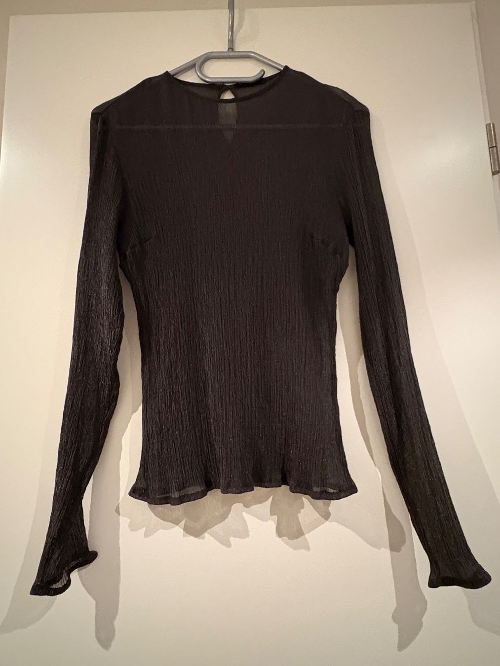 Sisley Top: Festlich glitzerndes Langarm Top Sisley – Usato da Tagelswangen venduto da lykainion
