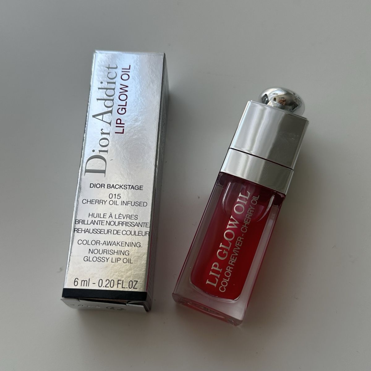 Dior Make-up: Dior Lip Glow Oil Cherry NEU – Neu und originalverpackt aus Givisiez von dor_xb9k