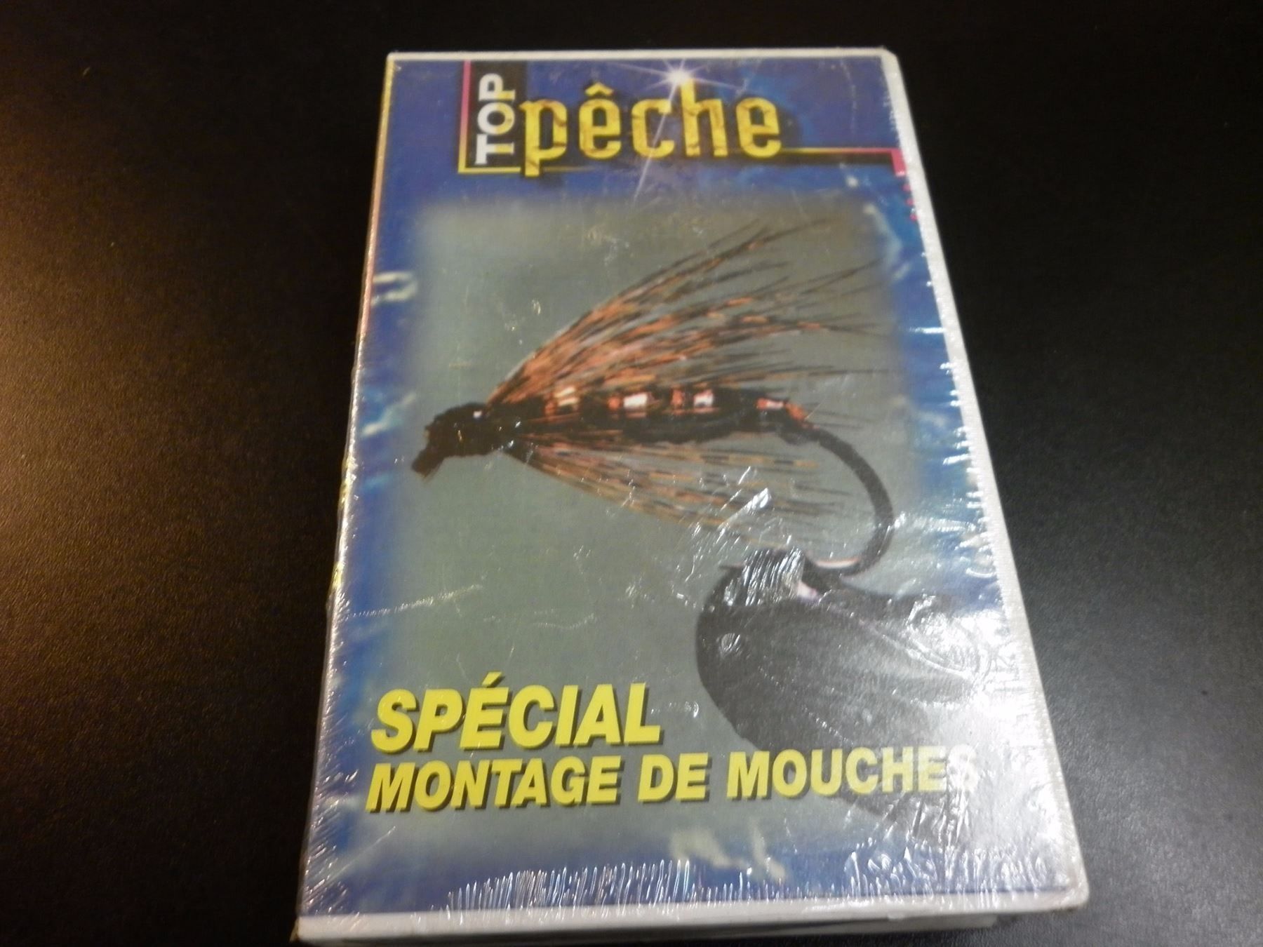Alle VHS: K7 video Special montage de mouches – Neu und originalverpackt aus Fribourg von versus702