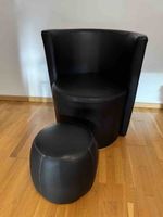 360 grad drehender Sessel schwarz mit Hocker