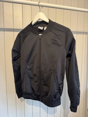 Adidas Trainingsjacke schwarz Strukturmuster guter Zustand 