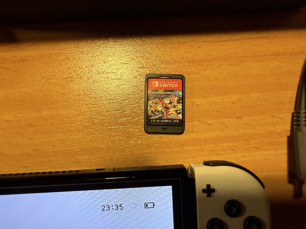 Nintendo Konsolen: Nintendo Switch OLED Ananas Edition mit Mario Kart – Gebraucht aus Dierikon von E28_Freak 2