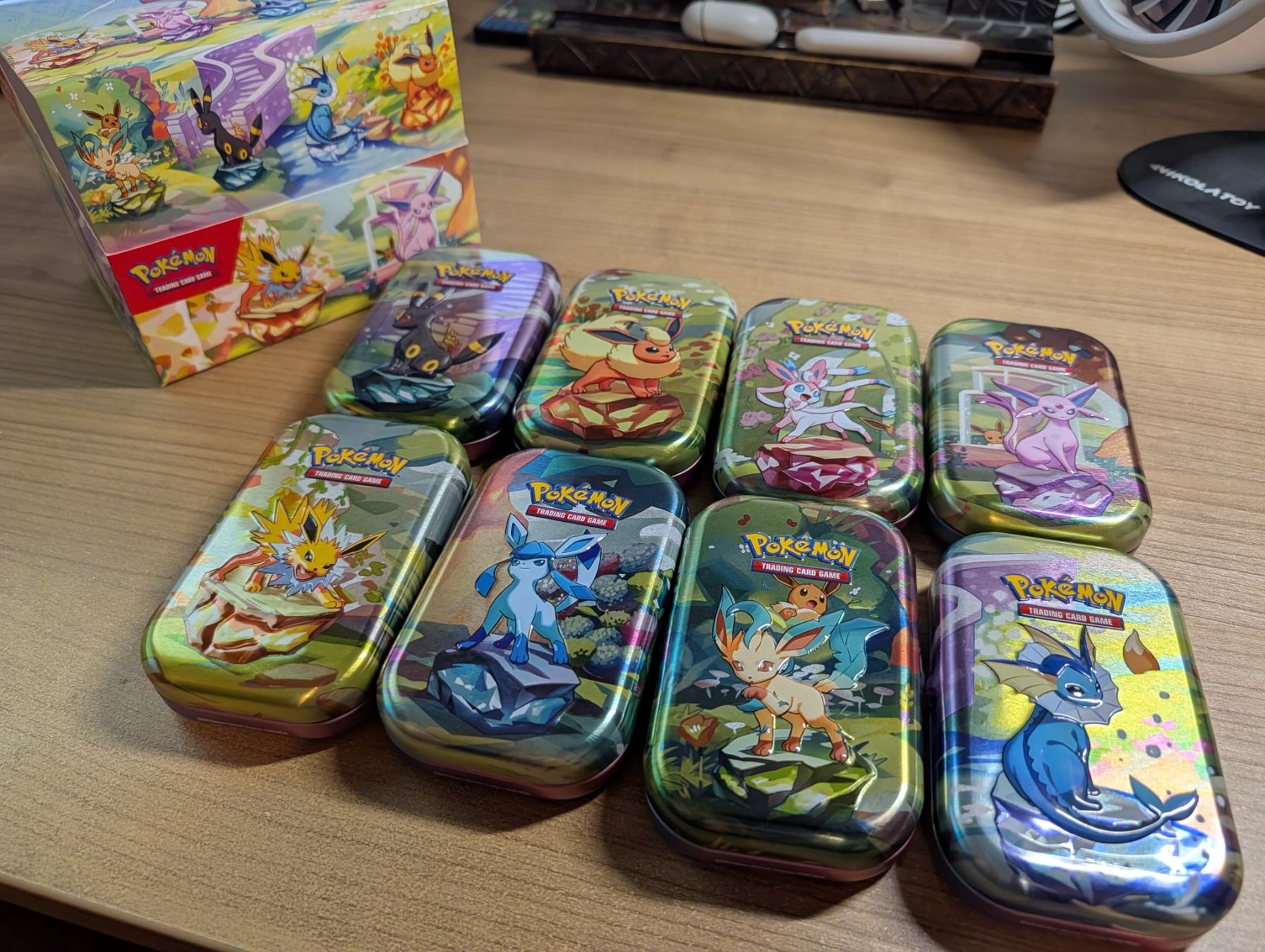 Giochi: Pokemon Prismatic Evolutions Mini Tins Complete (8/8) EMPTY – Usato da Glattpark(Opfikon) venduto da fnhabach