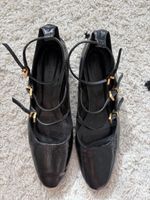 Hohe Schuhe mit Schnallen von Massimo Dutti
