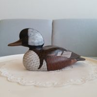 80 er Jahren  fein handbemalte Holzfigur eines Gänsesägers