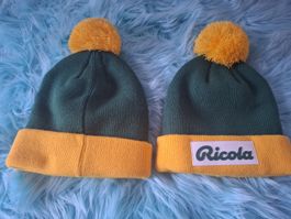 2x Ricola Mütze Neu – Grün Gelb Pompon Winter Merchandising