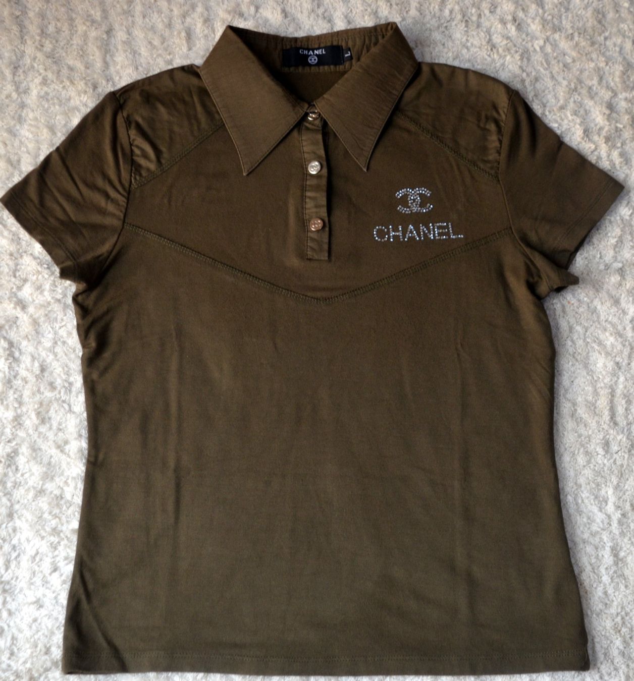 Chanel T-shirt: Chanel T-Shitrt Polo L – Usato da Collonges venduto da Auganien
