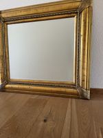 Spiegel in vergoldetem Rahmen