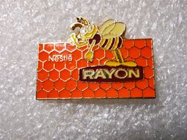 Ansteckpin 10: Nestle Rayon