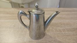 Piccola caraffa in acciaio cromato Alessi