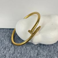 Bracelet en acier inoxydable et OR 18K