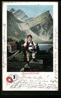 Junge in Appenzellertracht mit Stock und