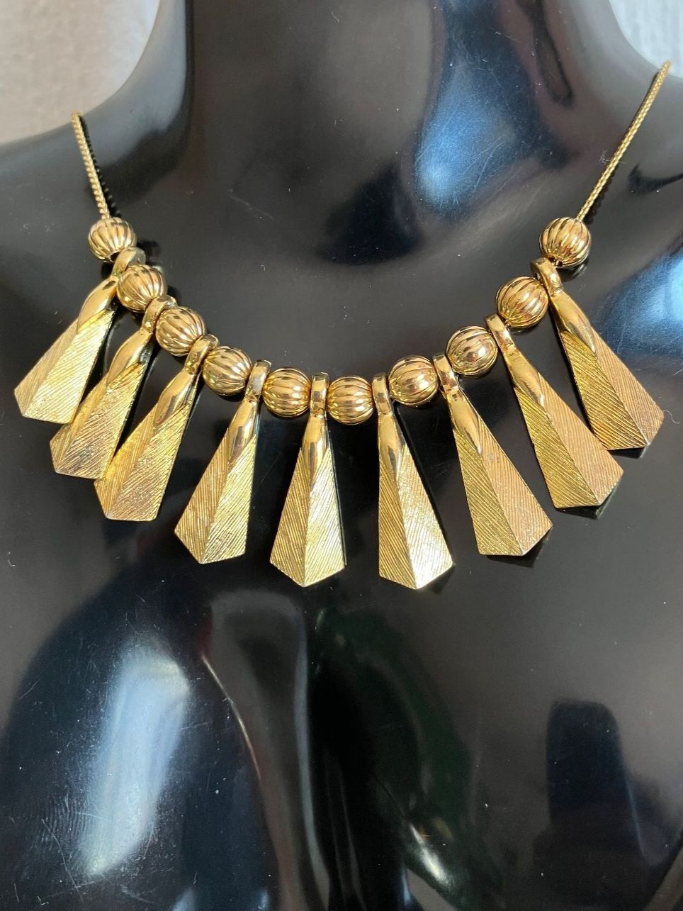 Catenine: Collier vintage doré à franges – Usato da Peseux venduto da Cresus27