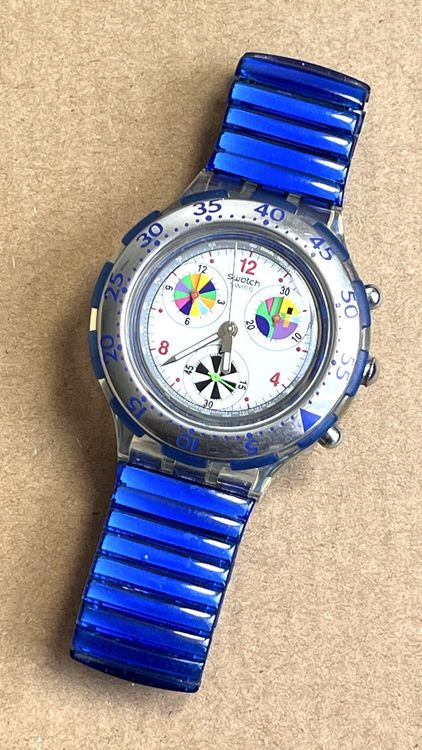 Swatch Montres: Blaue Swatch Uhr mit bunten Elementen-Sammlerstück! – D'occasion à Grenchen par chththl