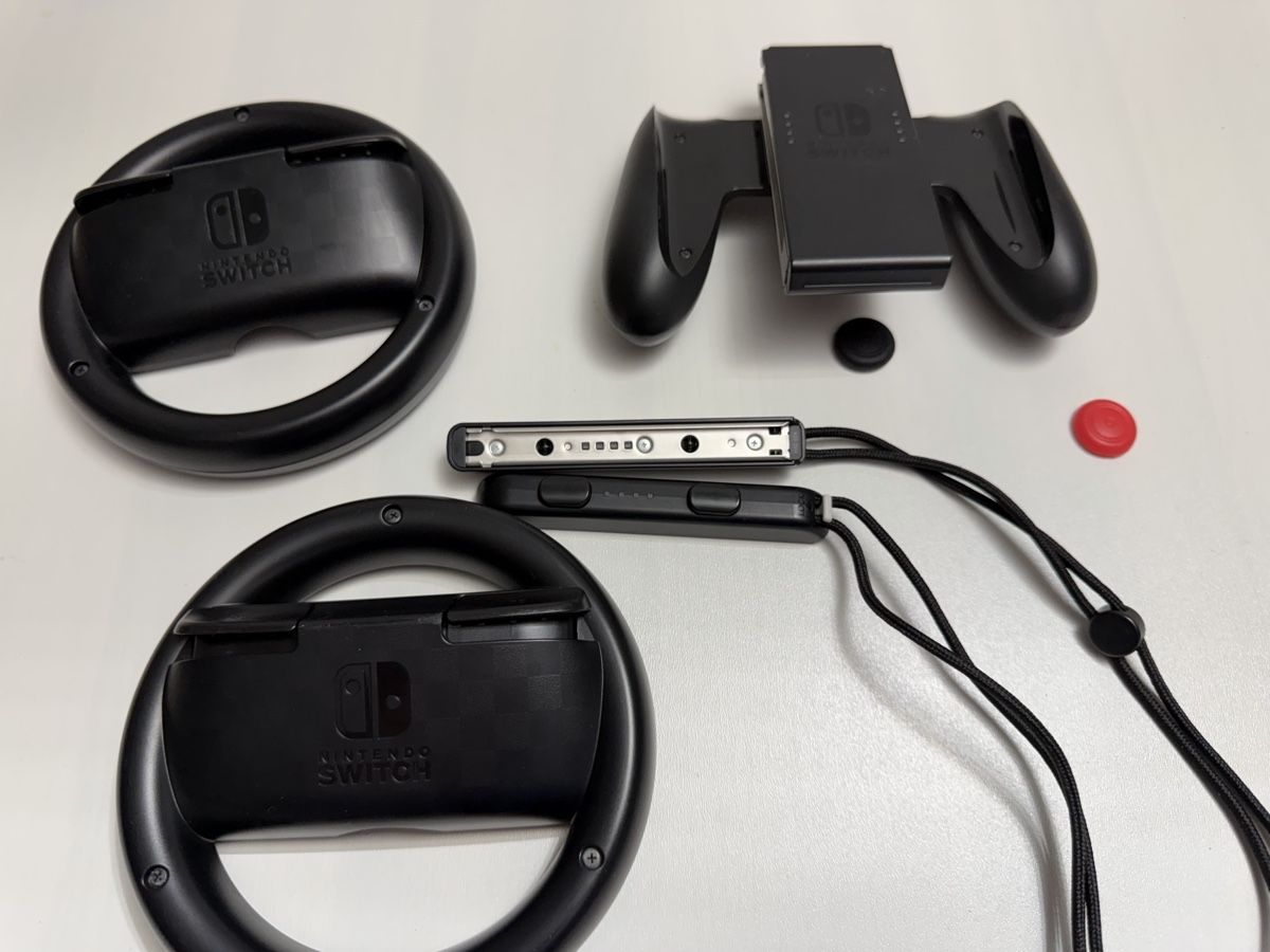Nintendo Giochi: Accessoires Nintendo Switch volants et support noir – Usato da Brügg BE venduto da Goob 3
