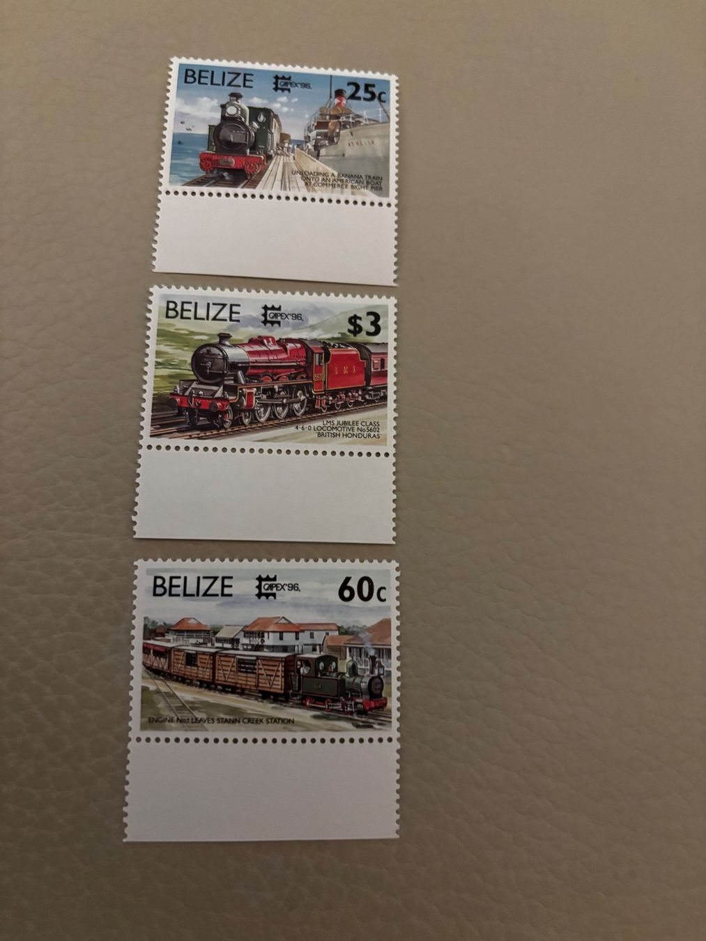 Tutti i francobolli: 3 seltene Belize Briefmarken Züge Dampfloks – Nuovo e nell'imballaggio originale da Zürich venduto da engebrunau