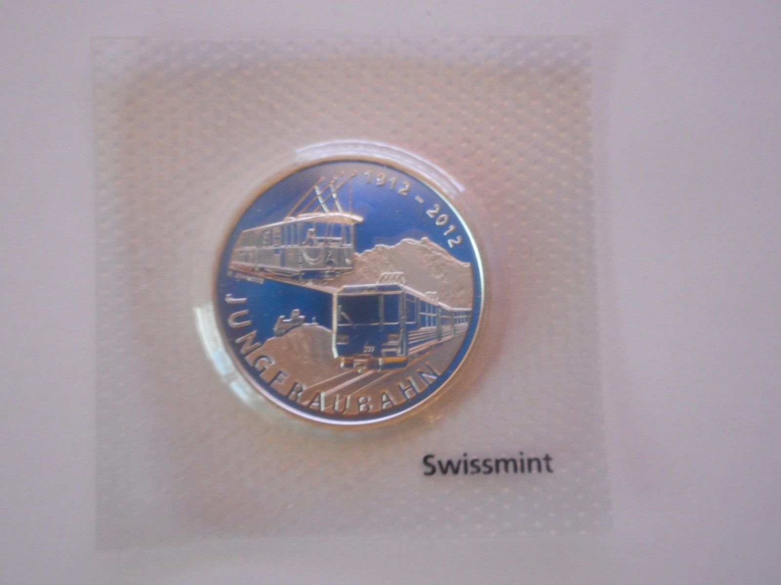 Tutti le monete: 20 Fr. 2012  silber  unz/stgl  Jungfraubahn – Nuovo e nell'imballaggio originale da Kriegstetten venduto da pizlad2010