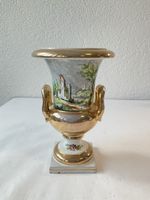 Ancien vase en porcelaine doré et peint