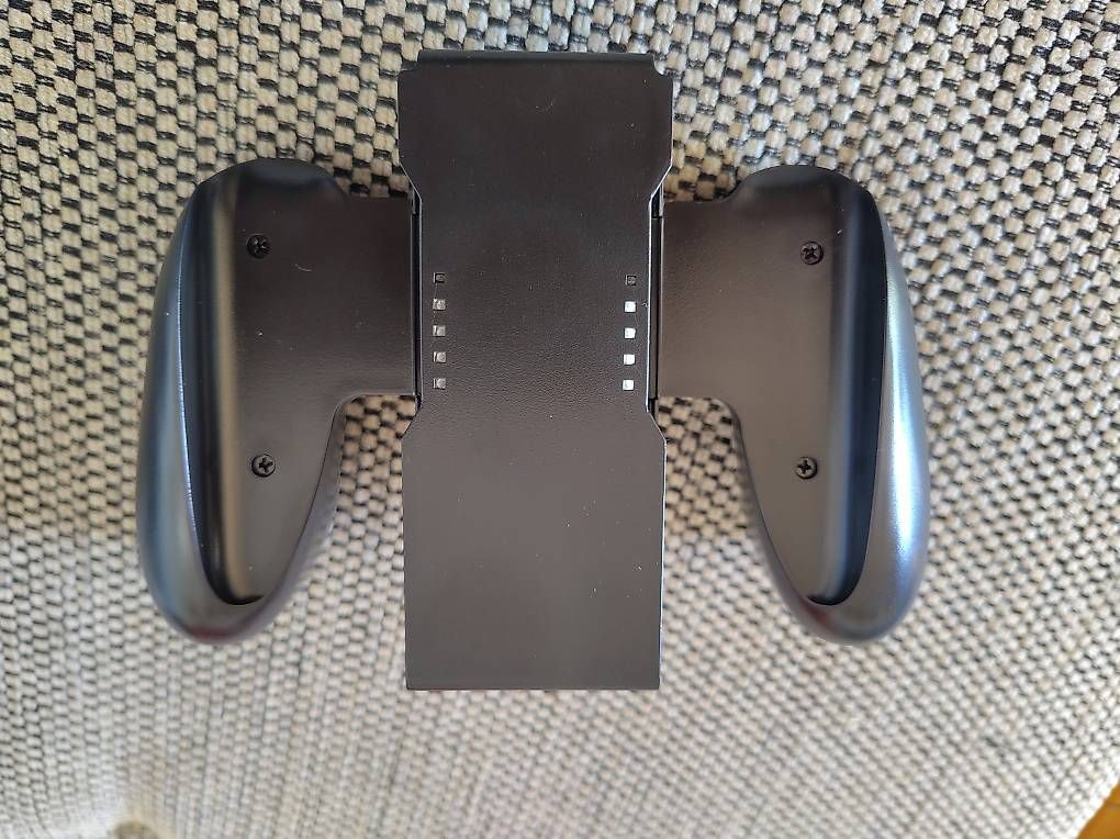 Controller: NEU: Grip für Nintendo Switch Joy Con – Nuovo e nell'imballaggio originale da Wohlen AG venduto da gnabbr 1