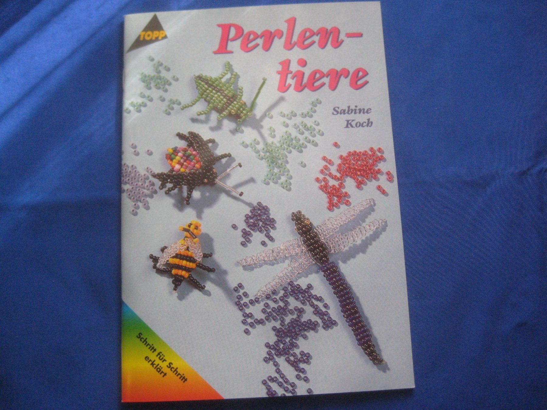Libri: PERLEN - TIERE  BÜCHLEIN ZUM  BASTELN – Nuovo (secondo la descrizione) da Uster venduto da flocke1
