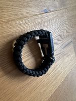 Schwarzes Survival-Armband, neuwertig
