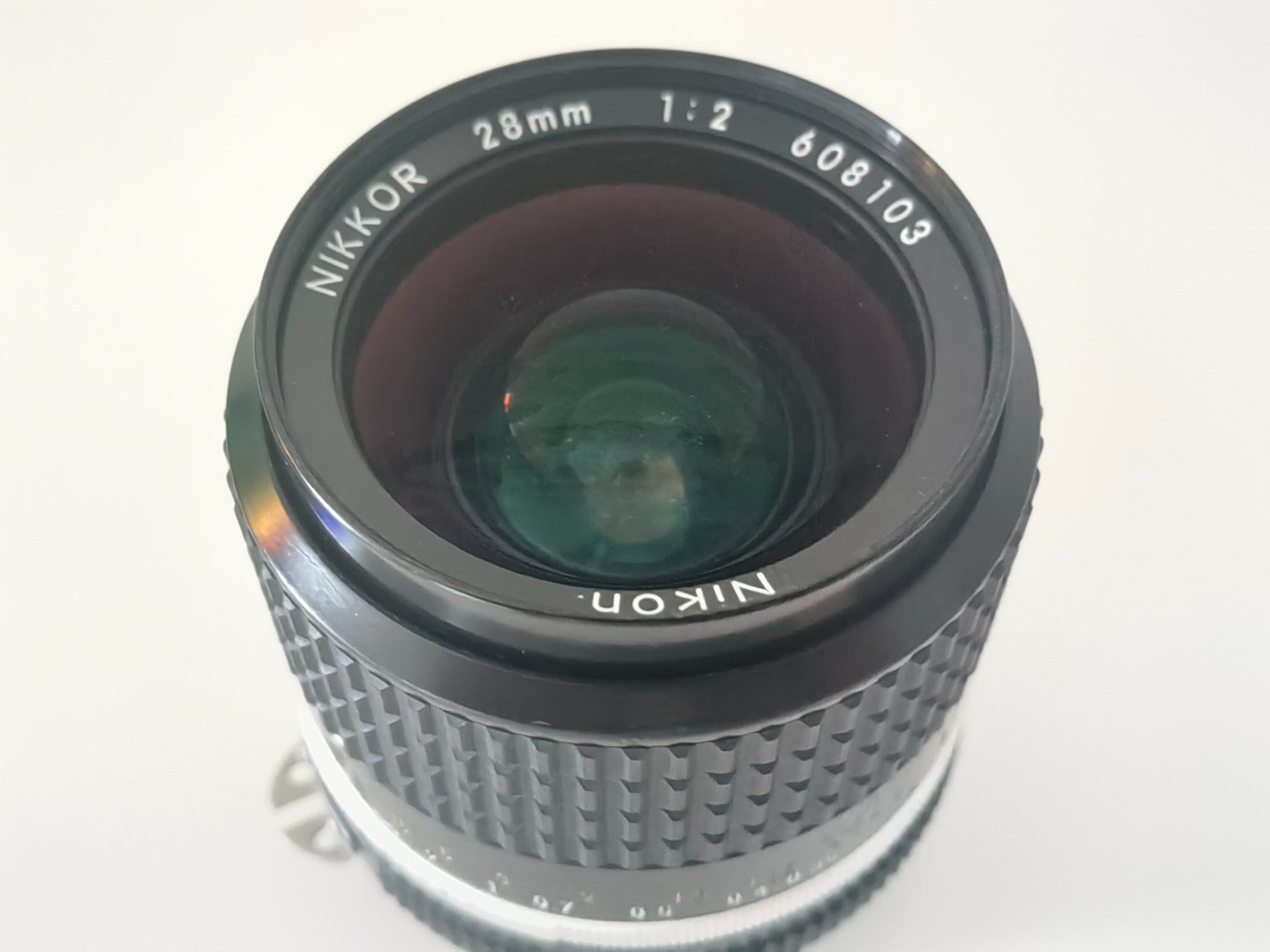 Nikkor Obiettivi: Nikkor Objectiv 28 mm f2 MF – Usato da Mols venduto da armanwalensee
