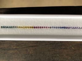 SAPHIRE (H) Regenbogen im Brilliantschliff   2.0mm = 1.65cts