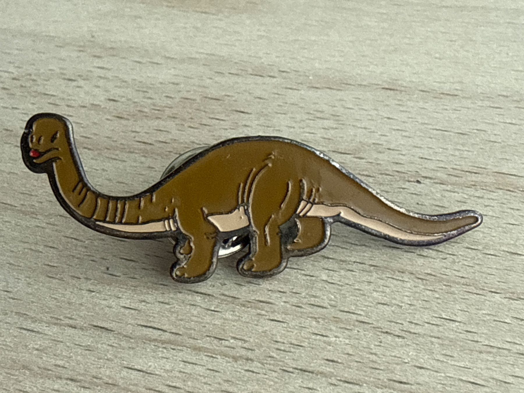 Plaketten & Abzeichen: Pin Dinosaurier – Gebraucht aus Glattbrugg von Schweigmatt