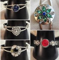 2 bracciali con bottone intercambiabile