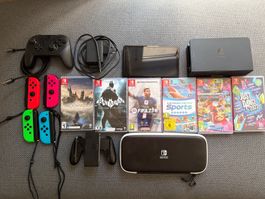 Nintendo Switch Oled + 6 jeux + dock + extra controllers