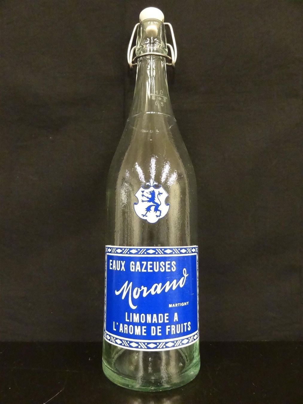 Bicchieri, Caraffe & Bottiglie: alte Flasche MORAND MARTIGNY 1963 – Usato da Kerzers venduto da Flaschenposten