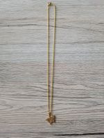 Goldige Halskette mit Schmetterling Anhänger