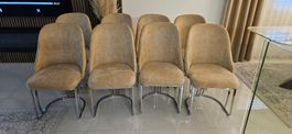 8 Esszimmer Stühle in beige mit eleganten Chrome Kufen