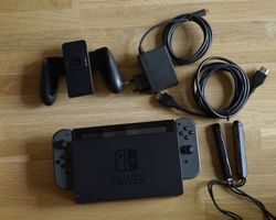 Nintendo Switch complète avec accessoires ( Excellent état )