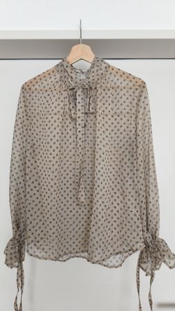 Translucent Beige Blouse with flower pattern, ideal for offi