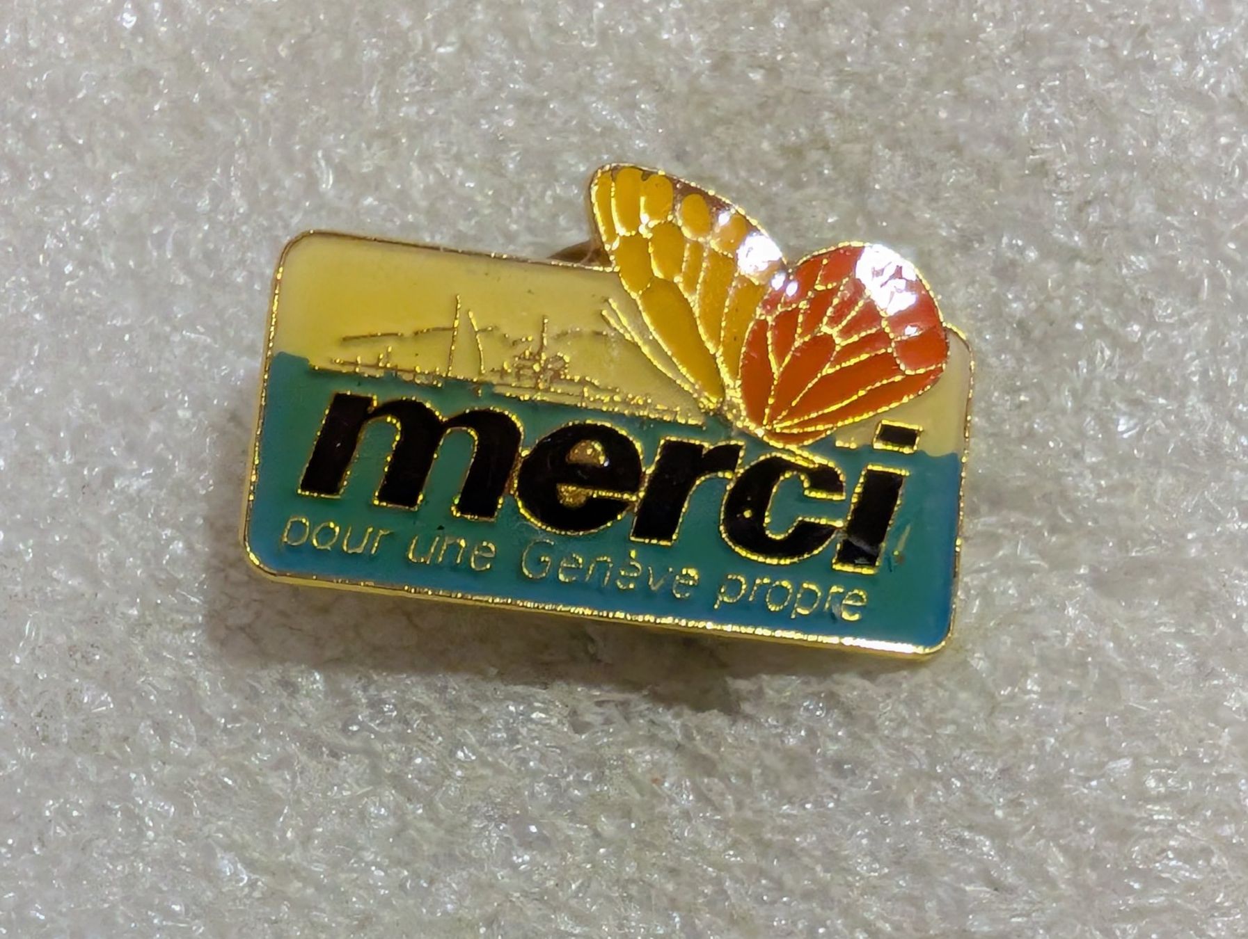 Placchette & Badge: Ansteckpin 211: Merci – Usato da Oppligen venduto da Pin-Fall-Shop
