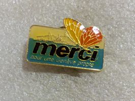 Ansteckpin 211: Merci