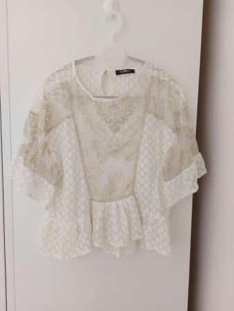 Blouse marque italienne de luxe, à volants
