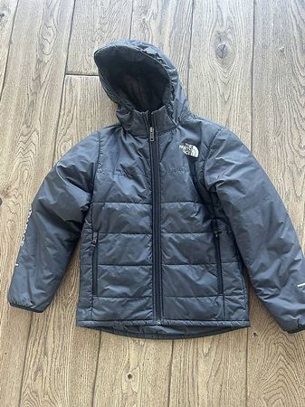 Veste the north face taille L = 146/152 8-10 ans