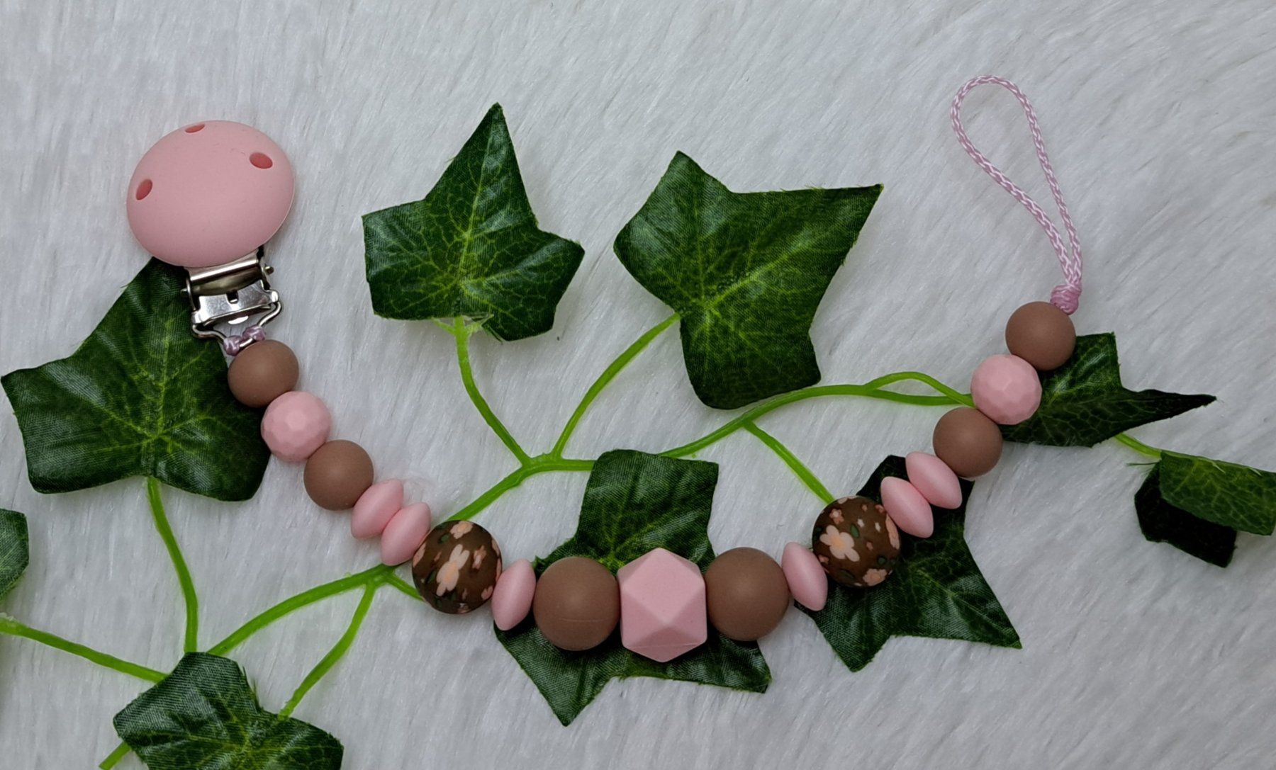 Succhiotti & catenelle porta ciuccio: Nuggikette Rosa oder Beige – Nuovo e nell'imballaggio originale da Oberurnen venduto da rotty80 1