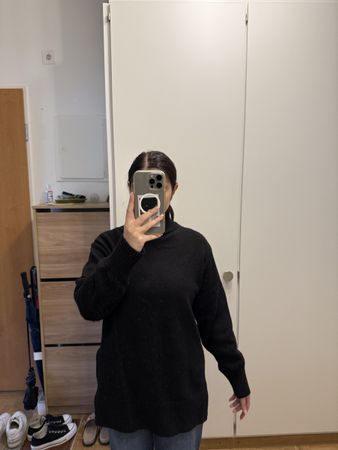 Pull col roulé noir