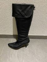 Bottes en cuire noire à lacets, longue tige
