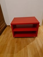 Rotes beistell Tisch mit Rollen