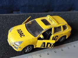 Siku Porsche Cayenne Turbo ADAC Spielzeugauto gelb gebr. 