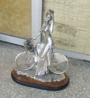 Sculpture de femme à vélo en argent laminé BRUNEL vintage