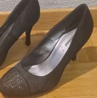 Elegante, neuwertige, schwarze Pumps, Gr. 38