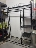 Kleiderständer Metall schwarz mit Rollen und Ablagen